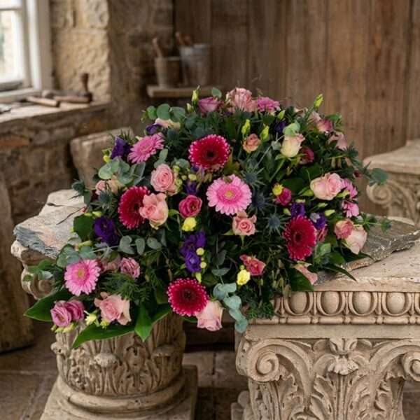 Rouwarrangement Druppel Roze